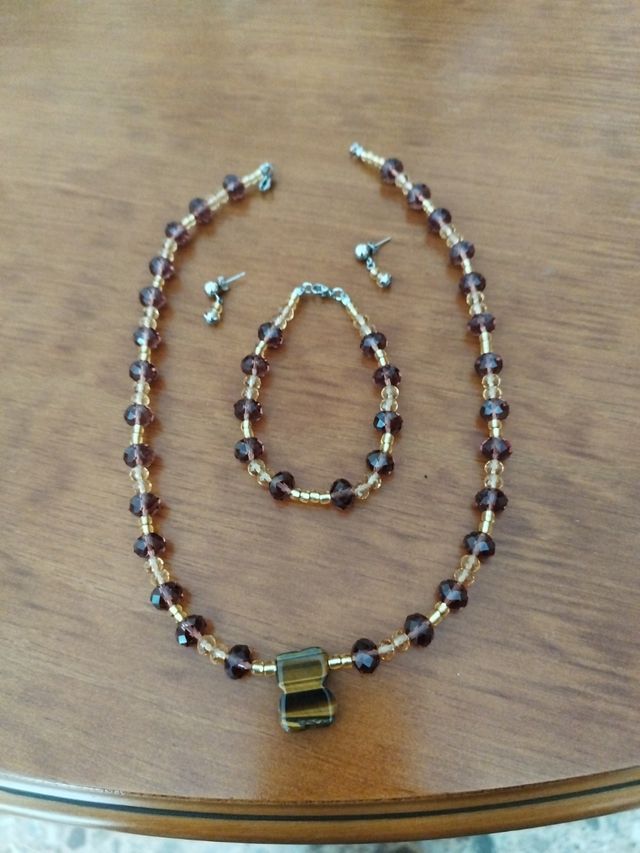 Conjunto de colgante pulsera y pendi