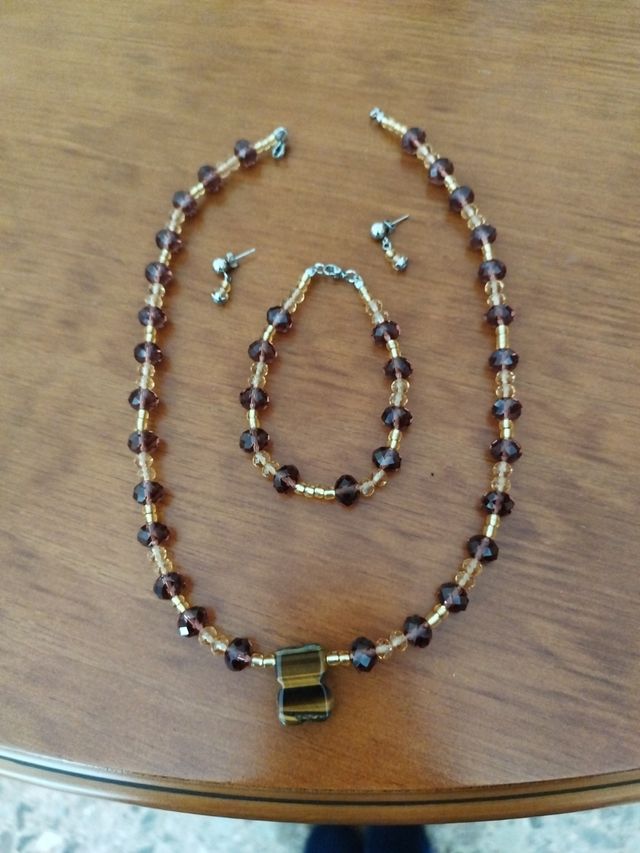 Conjunto de colgante pulsera y pendi