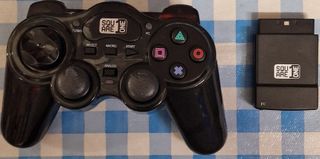 Juegos y mando Play II