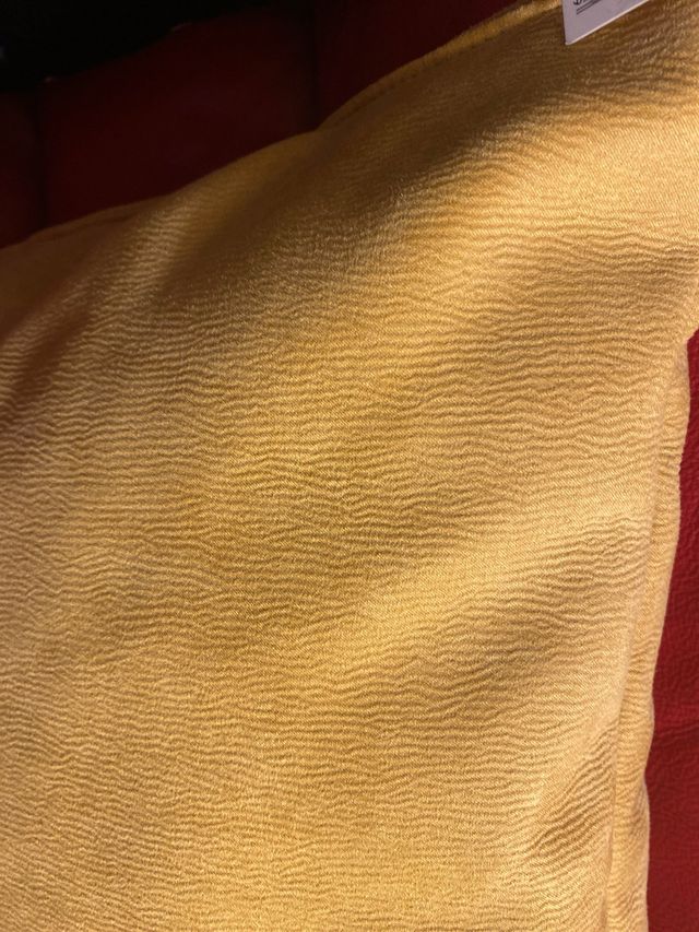 cojin sin estrenar, con etiqueta