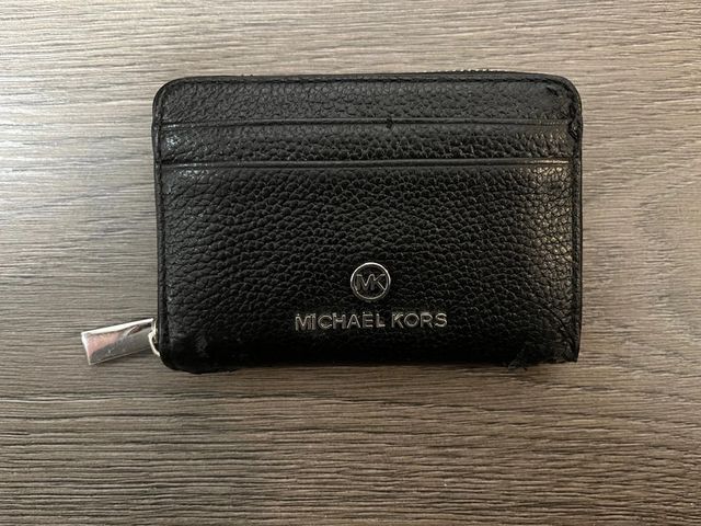 Portafoglio Michael Kors pelle rovinata