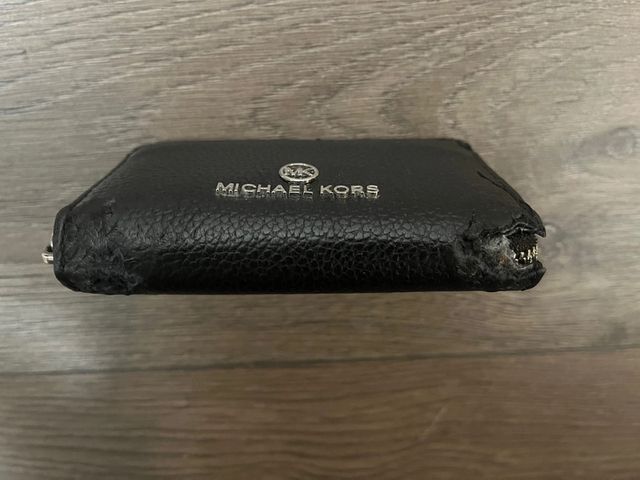 Portafoglio Michael Kors pelle rovinata