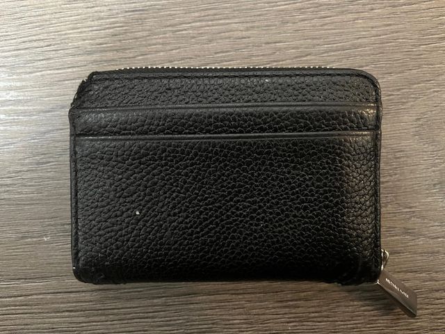 Portafoglio Michael Kors pelle rovinata