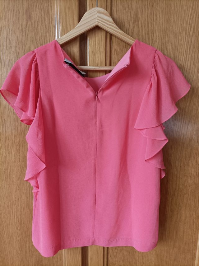 Camiseta rosa sin mangas