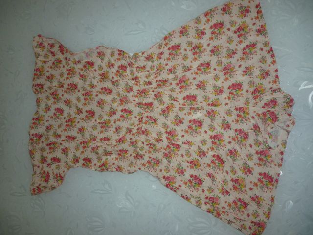 Tutina rosa con fantasia a fiori