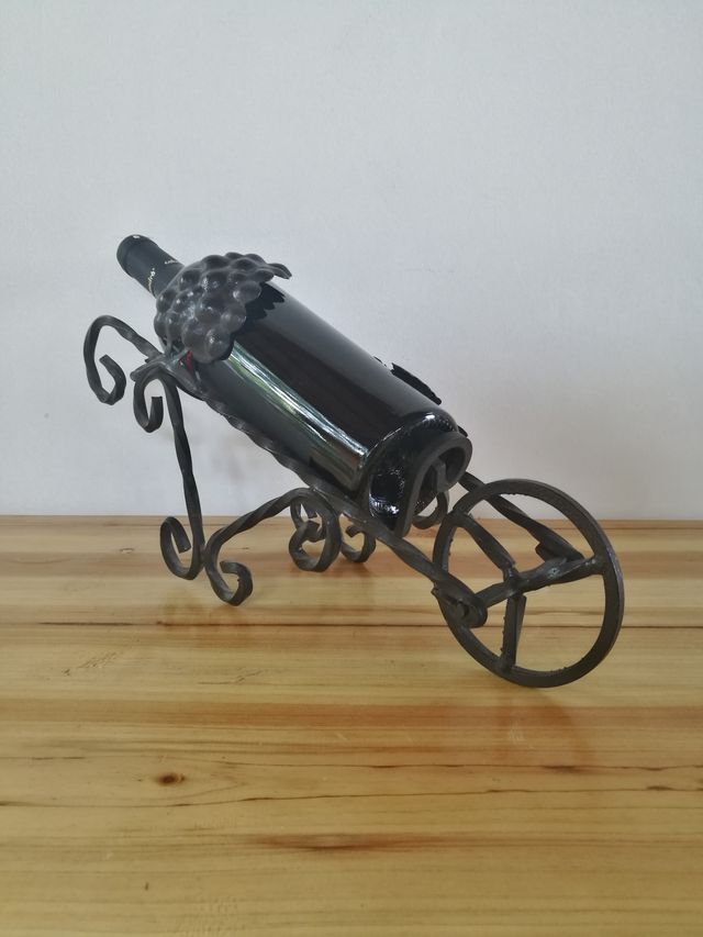 portabottiglia da vino in ferro battuto con foglia