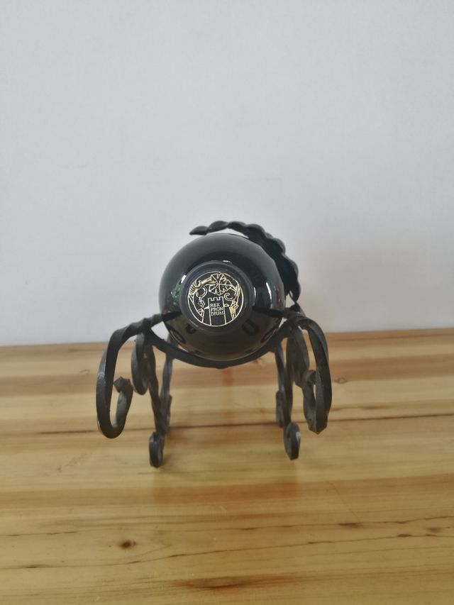 portabottiglia da vino in ferro battuto con foglia