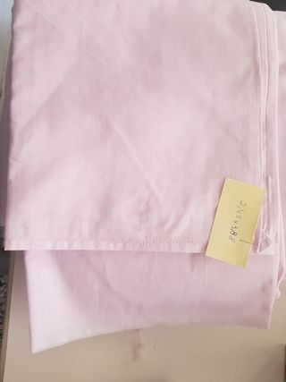 Tela de sábanas malva,rosa