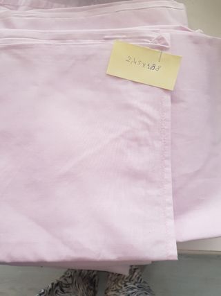 Tela de sábanas malva,rosa