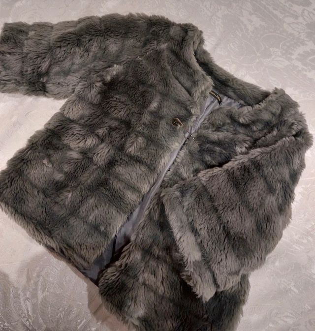 Pellicciotto manica a tre quarti