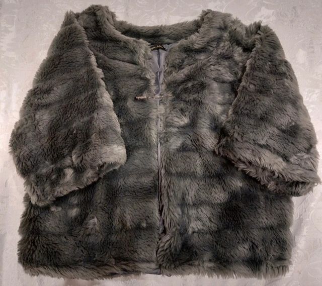 Pellicciotto manica a tre quarti