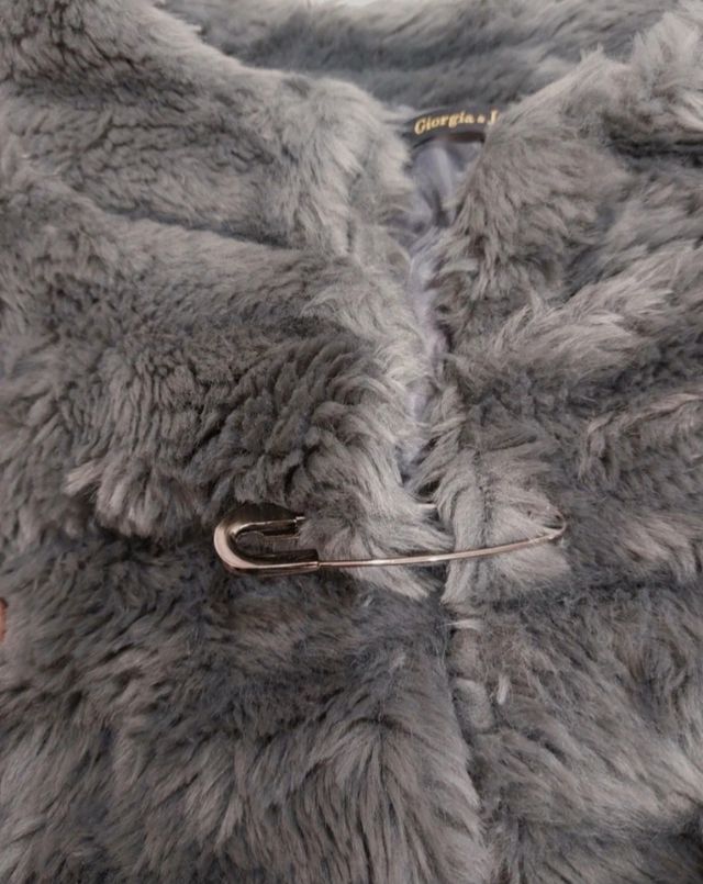 Pellicciotto manica a tre quarti