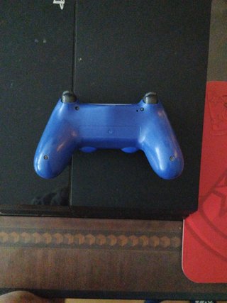 Play station 4 500 GB + 2 juegos + 1 mando azul