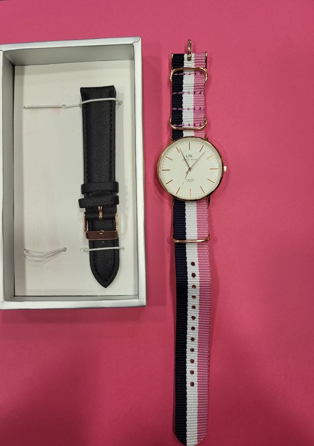 Reloj QW