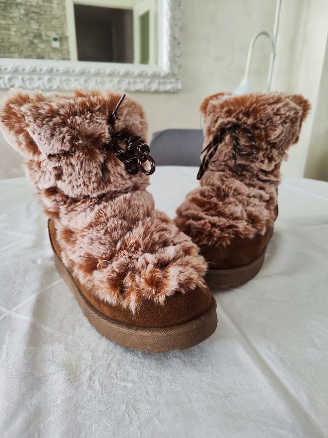 Botas de pelo marrones