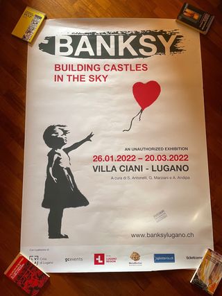 Manifesto pubblicitario mostra Banksy