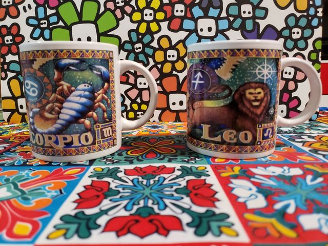 Tazze mug leone e scorpione