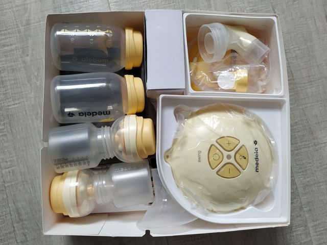 Sacaleches Medela Swing con 2 biberones y extras
