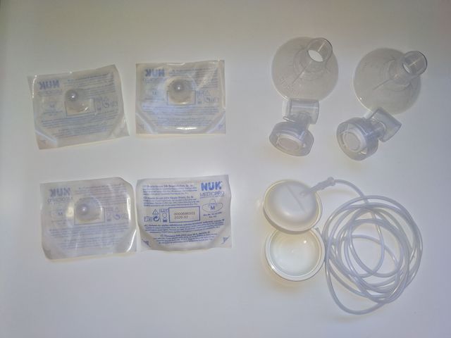 Sacaleches Medela Swing con 2 biberones y extras