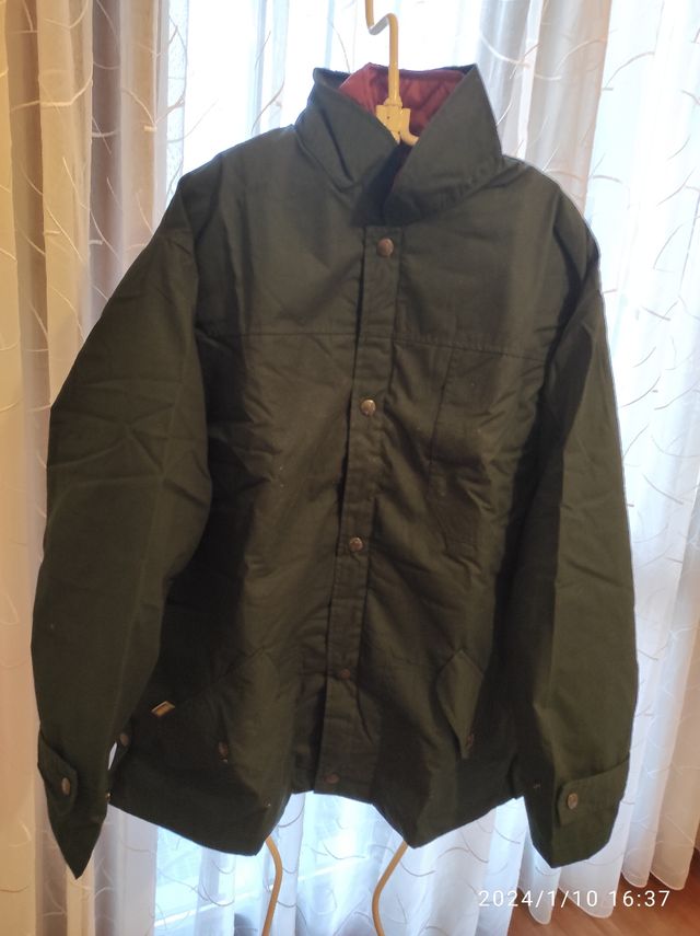 Giaccone con smanicato interno