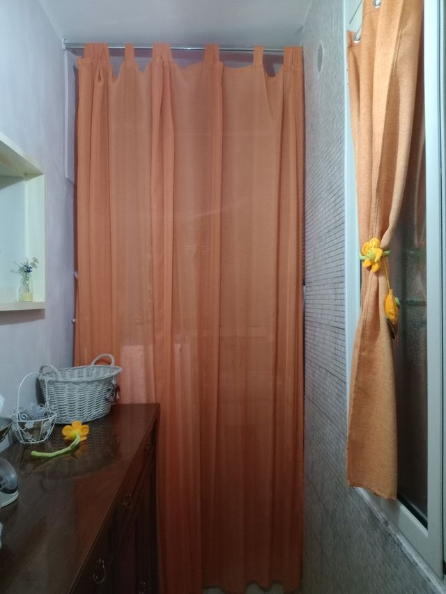 Tende e portierini arancio