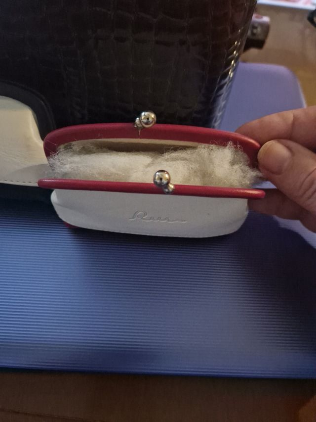 PORTAMONEDAS DE PIEL.