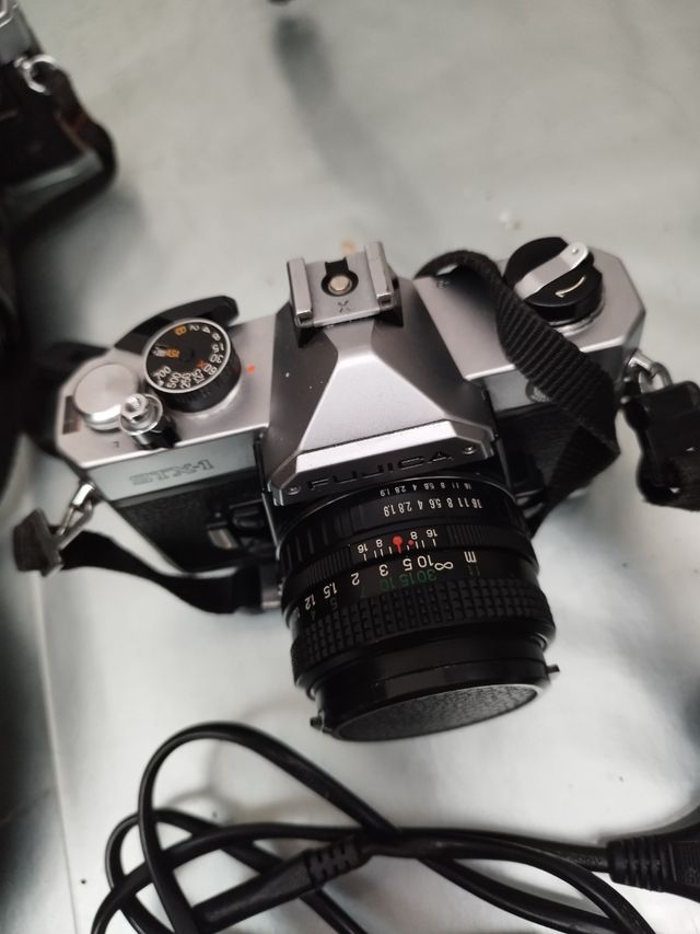 Macchine fotografiche con treppiede