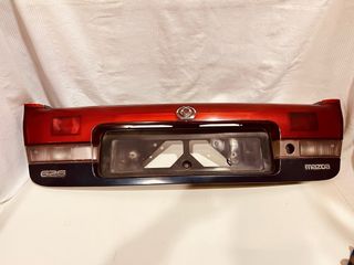 Embellecedor porton trasero Mazda 626 1997