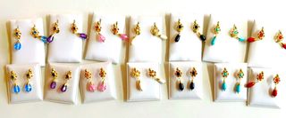 Pendientes corales niña de oro 18 kilates