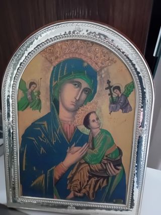 Cornice con immagine sacra in argento