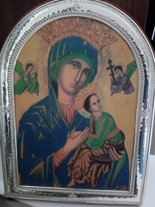 Cornice con immagine sacra in argento