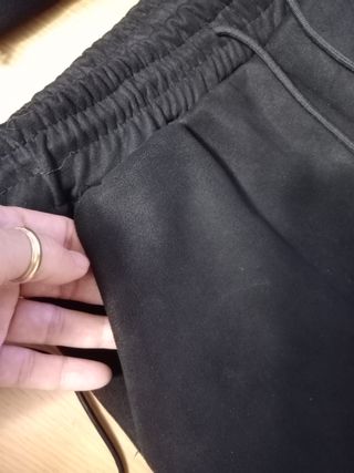 Tuta completa di colore nero, tg S.