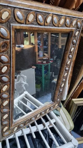 Espejo antiguo en hueso