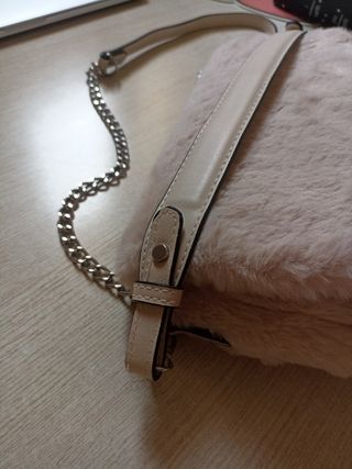 Bolso rosa de pelito para invierno.