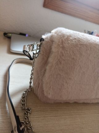 Bolso rosa de pelito para invierno.