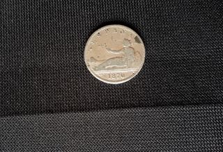 Moneda de plata de 1 pta.