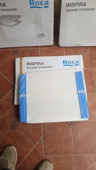 Tapa de inodoro marca Roca