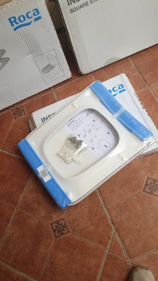 Tapa de inodoro marca Roca