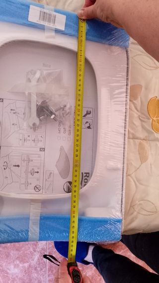 Tapa de inodoro marca Roca