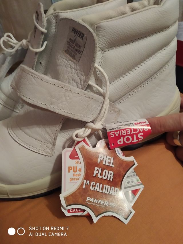 zapatos punta hierro