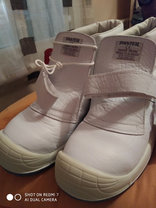 zapatos punta hierro