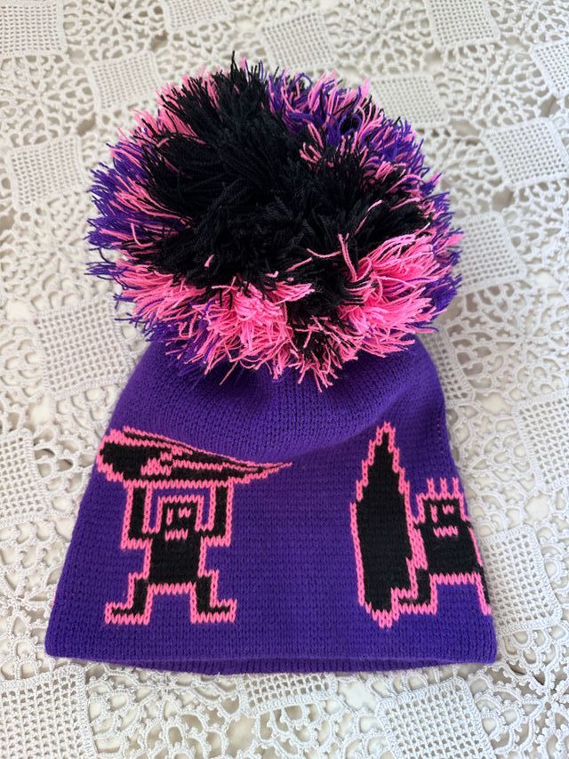 Gorro de punto con borla