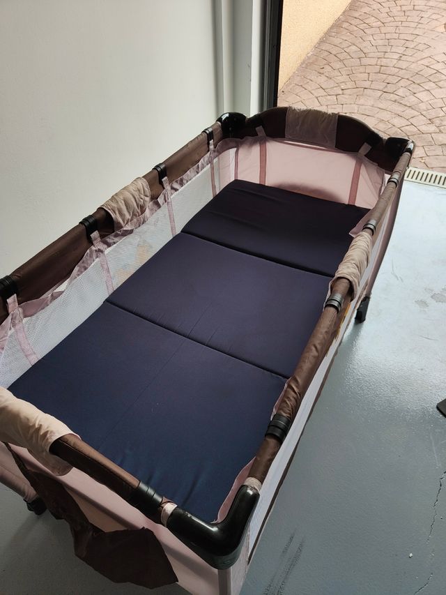 Cuna de viaje evolutiva