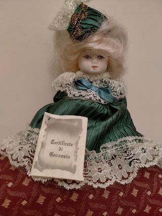 Bambole di porcellana biscuit 