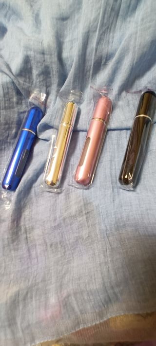 atomizador colonia , perfume  varios colores .