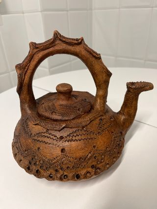 Set di teiere antiche in argilla e portacandele