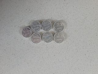 7 monete da 1 peseta