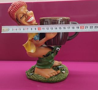 Figura rastafari con taza