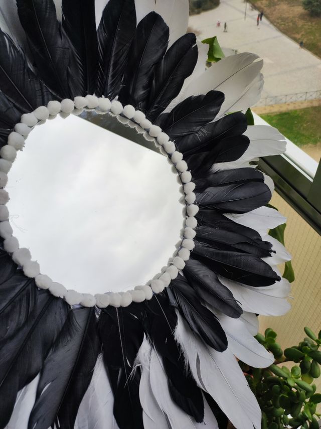 Espejo jujuhat plumas decoración