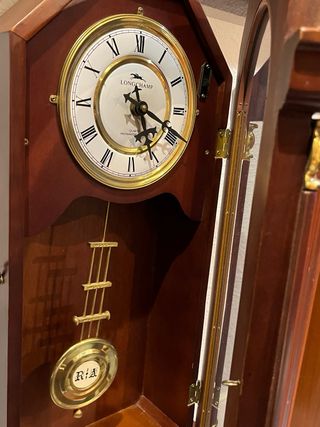 Reloj antiguo de pendulo